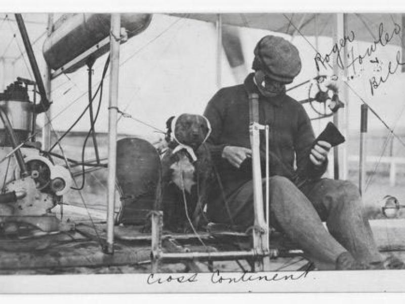 Postcard of early aviator, Robert Fowler and his dog Bill
